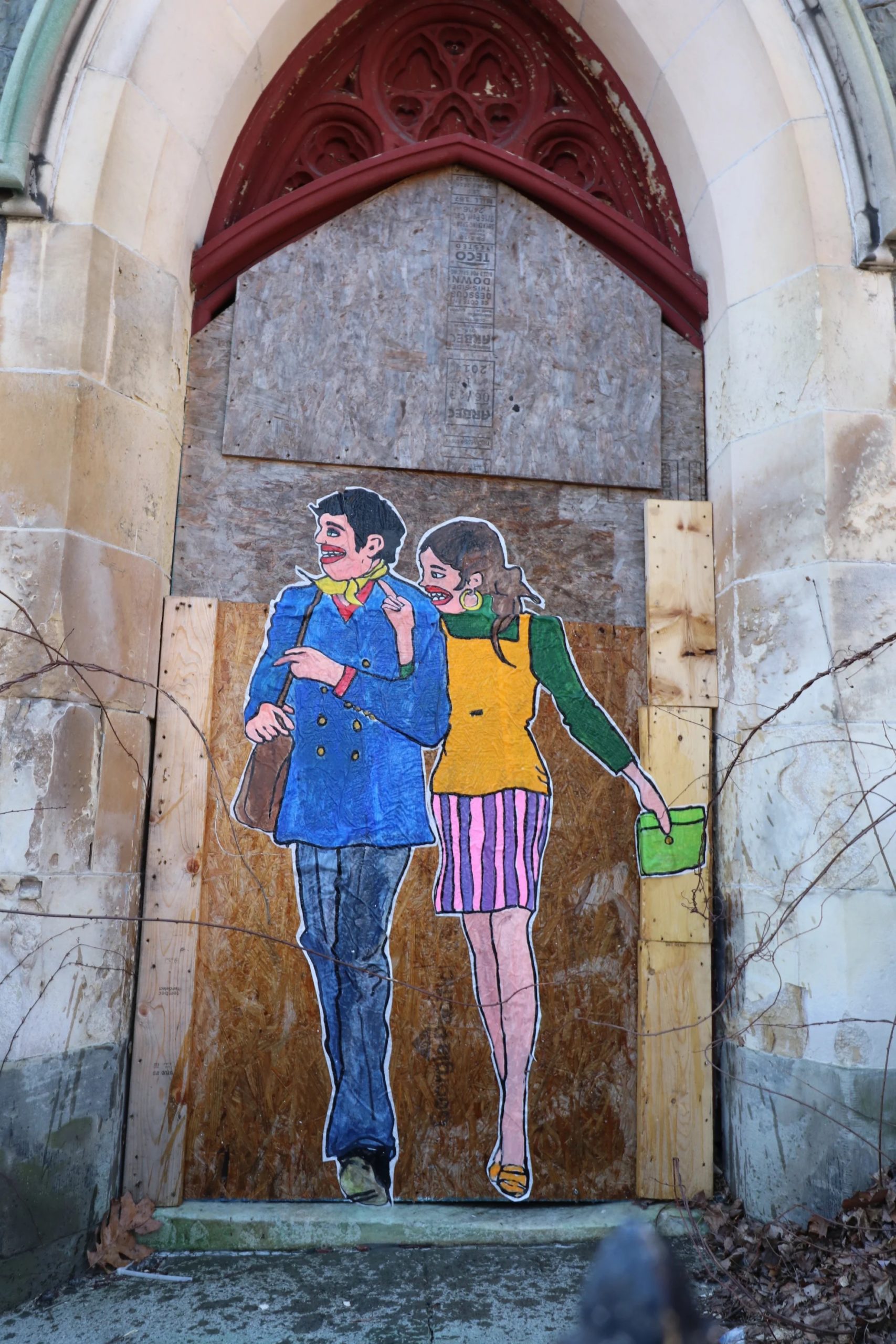 Goons street art couple walking arm in arm